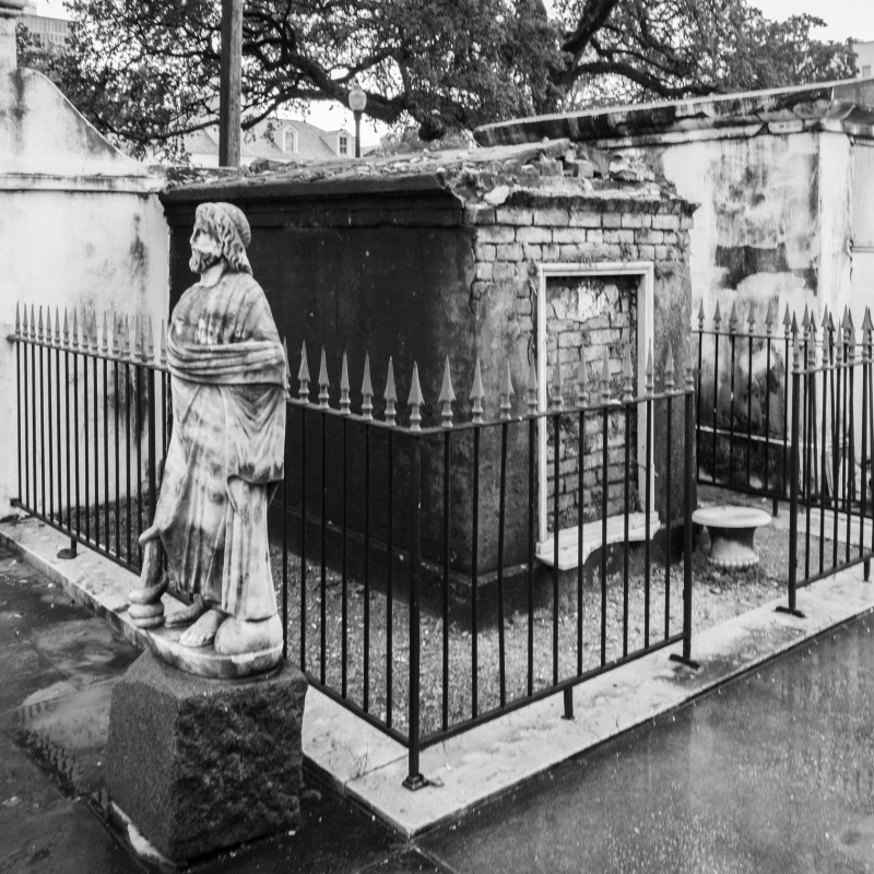 a black and white photo of a gate