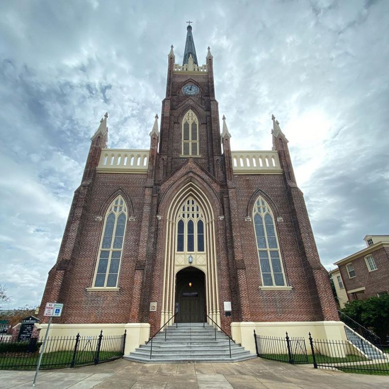 a large stone building with a clock tower